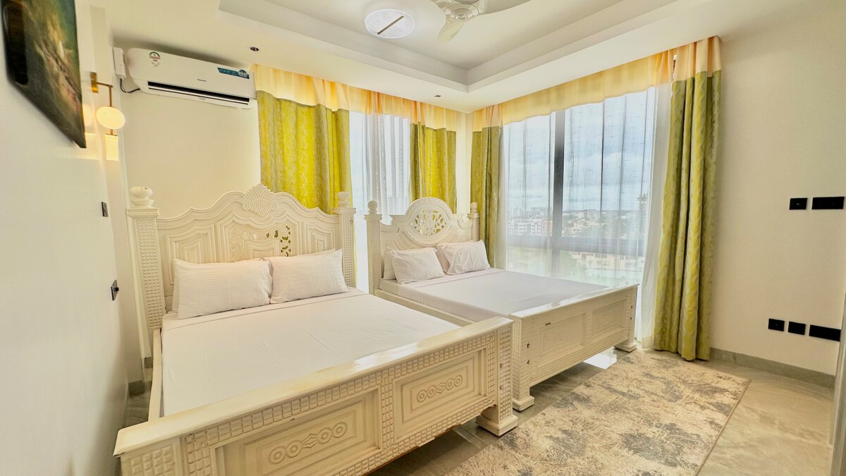 Nauras Apartment, Modern Coastal Stay 2BR — photo 7